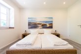 HochLukrative Kapitalanlage & Selbtnutzung - Ferienwohnung auf Rügen am Wasser - Beispiel Schlafzimmer
